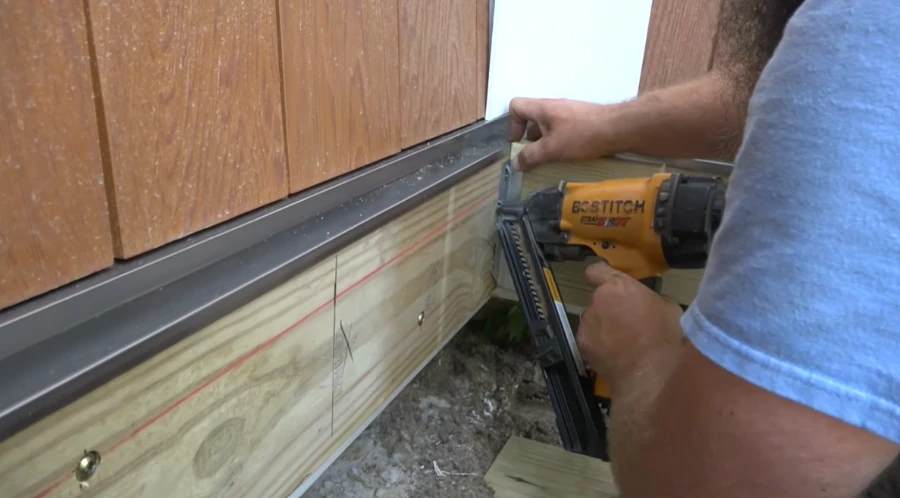 Installing composite decking fascia board on a Knoxville deck project