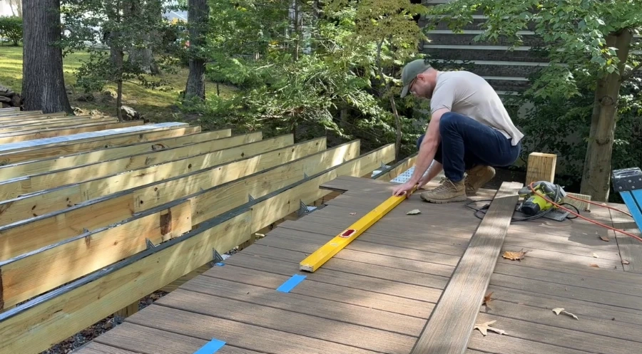 Deck builder securing composite decking boards, Knoxville, TN